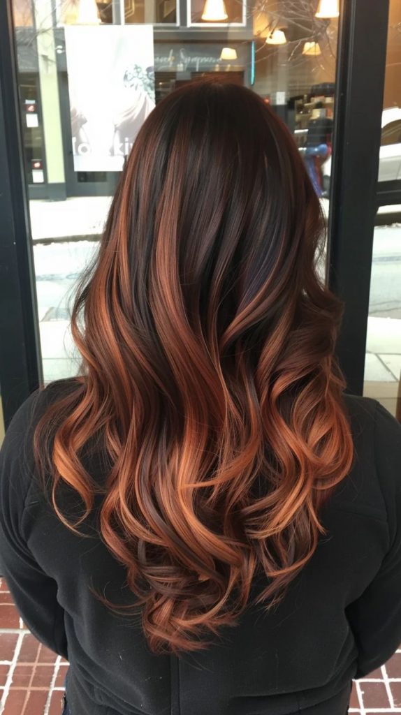Brunette balayage with curtain bangs and ash tones