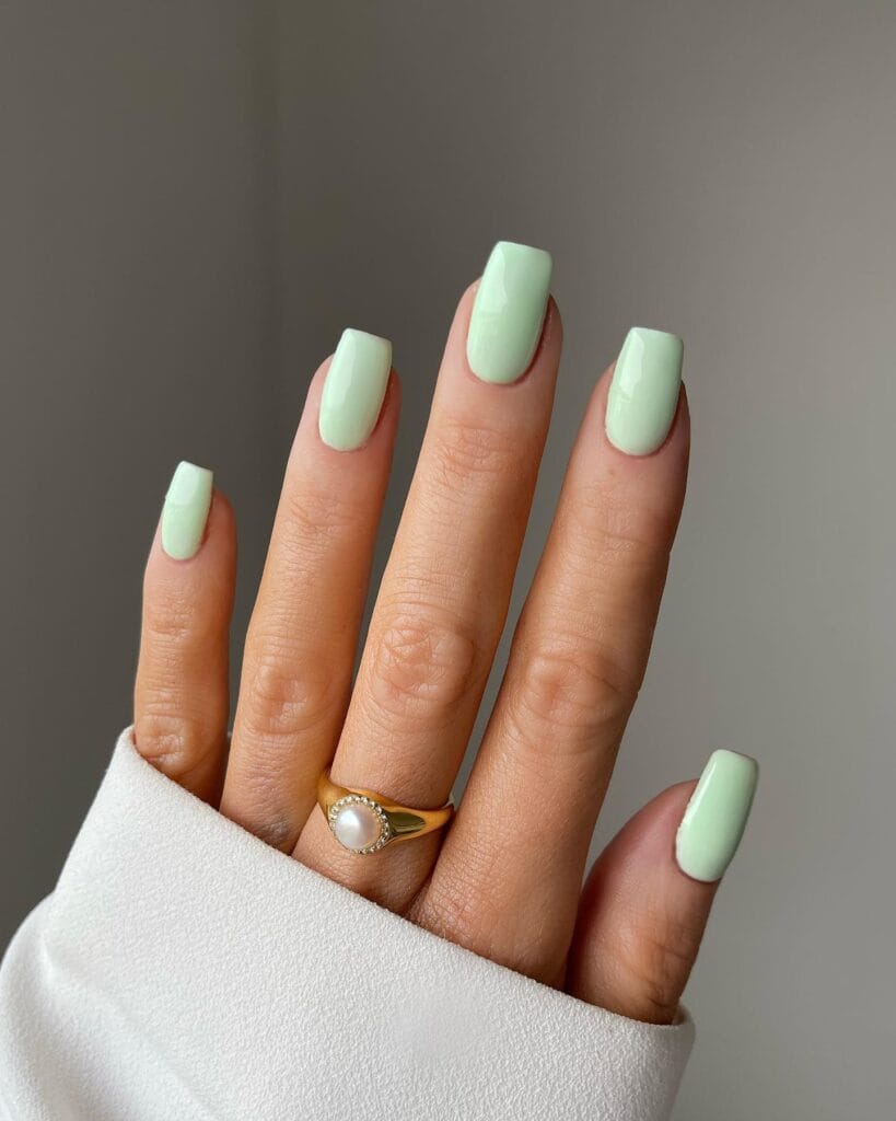 Pale frosted mint green winter nails