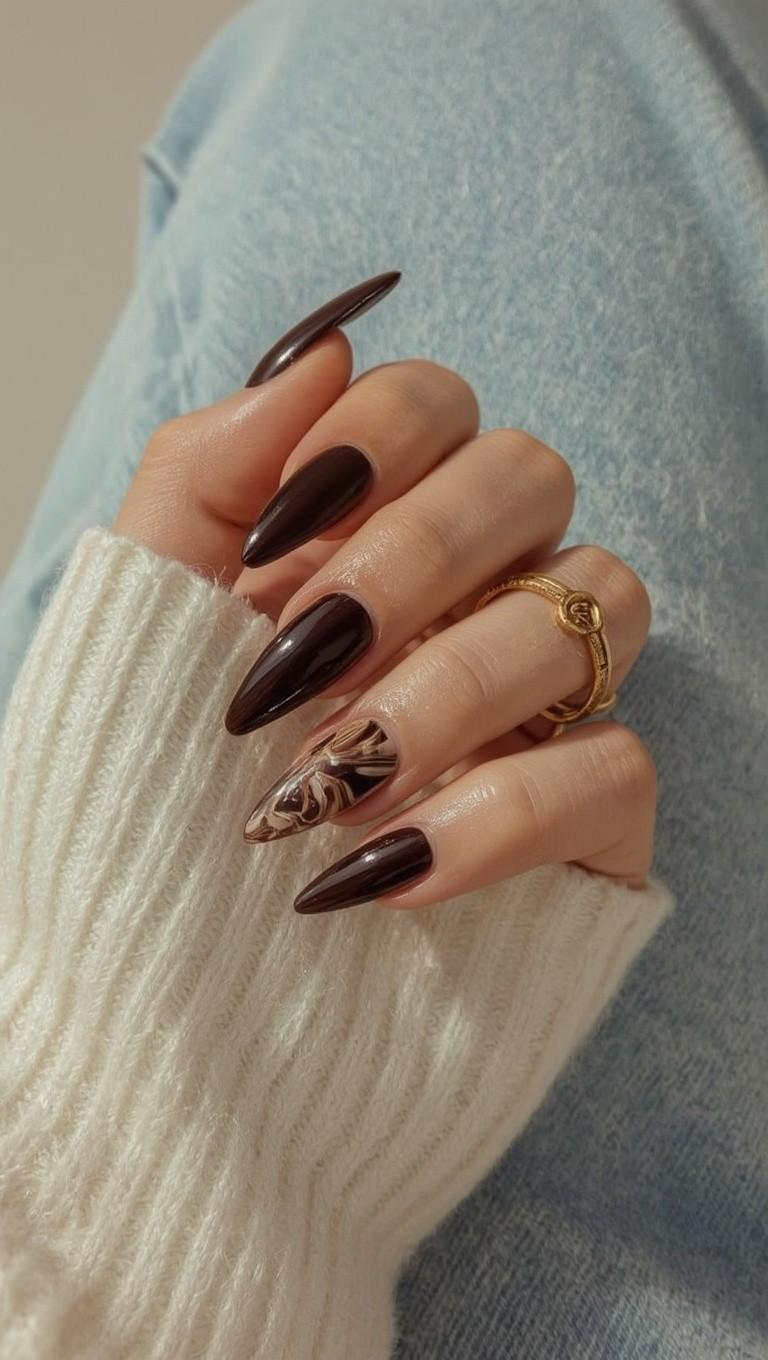 Hot chocolate brown almond nails with cream swirl art