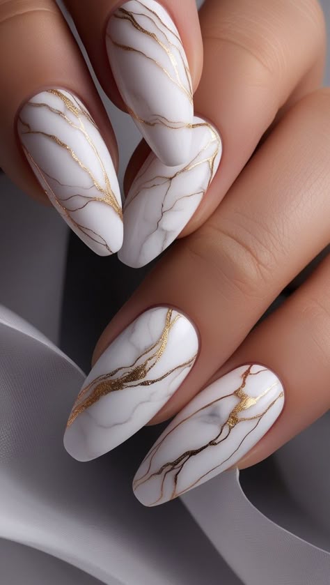 White nails with marble accent nail