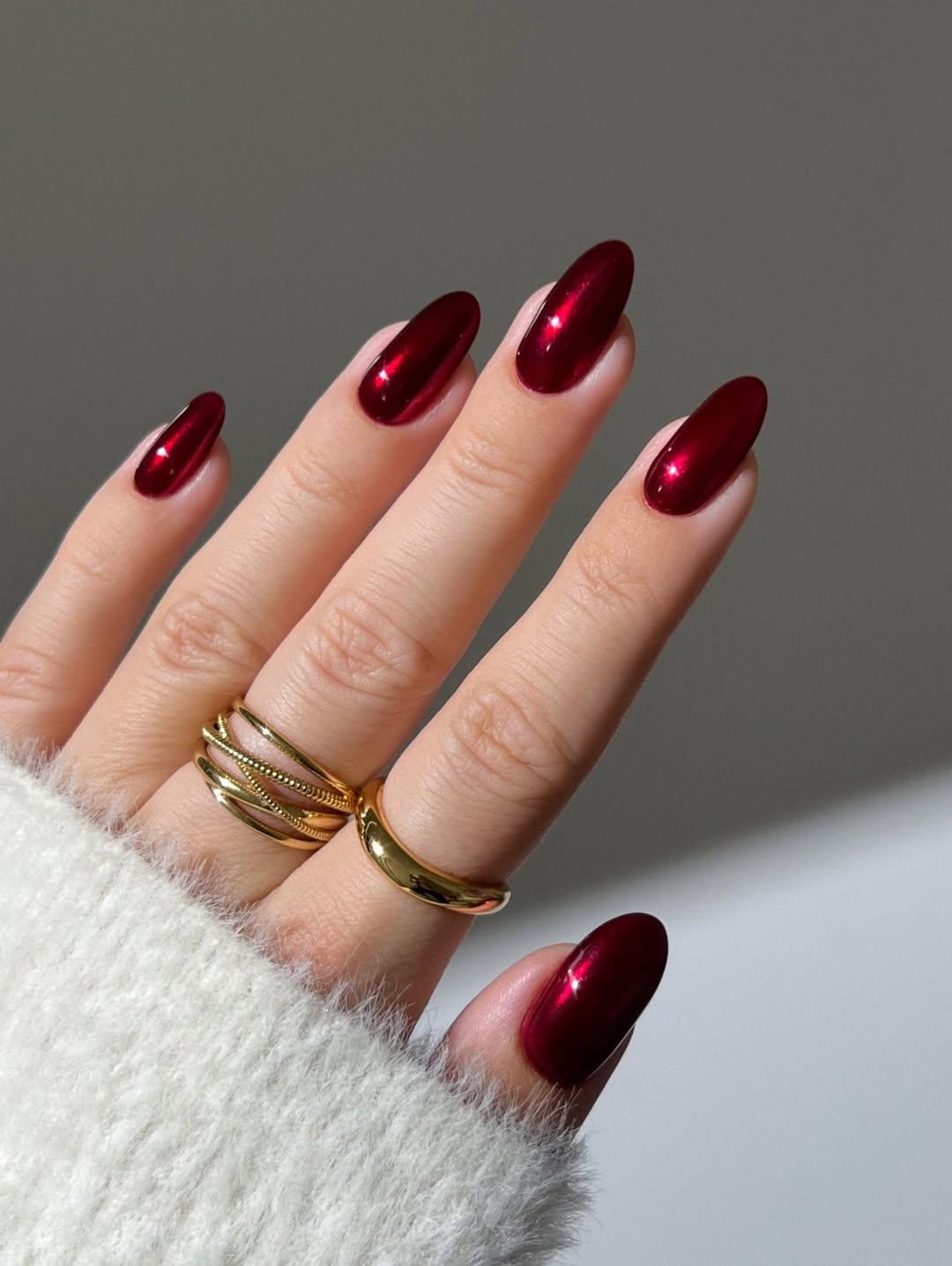 Dark cranberry red chrome manicure