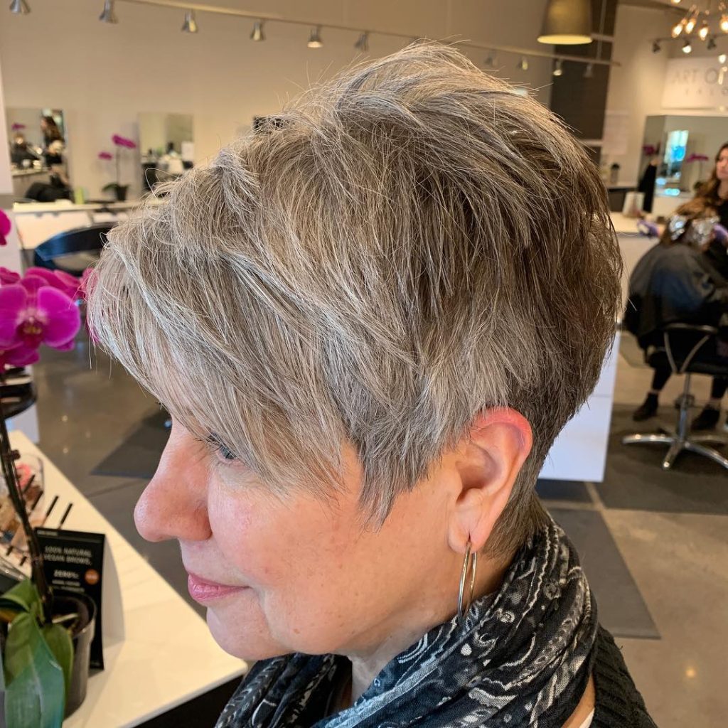 Gray layered pixie with natural texture photographed in a salon