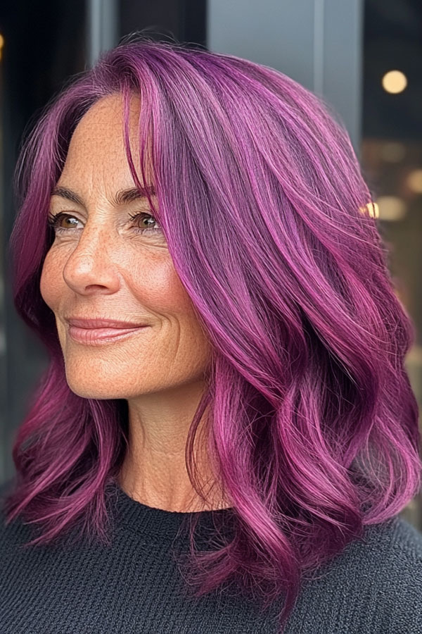 Collarbone-length layered haircut with soft face-framing layers