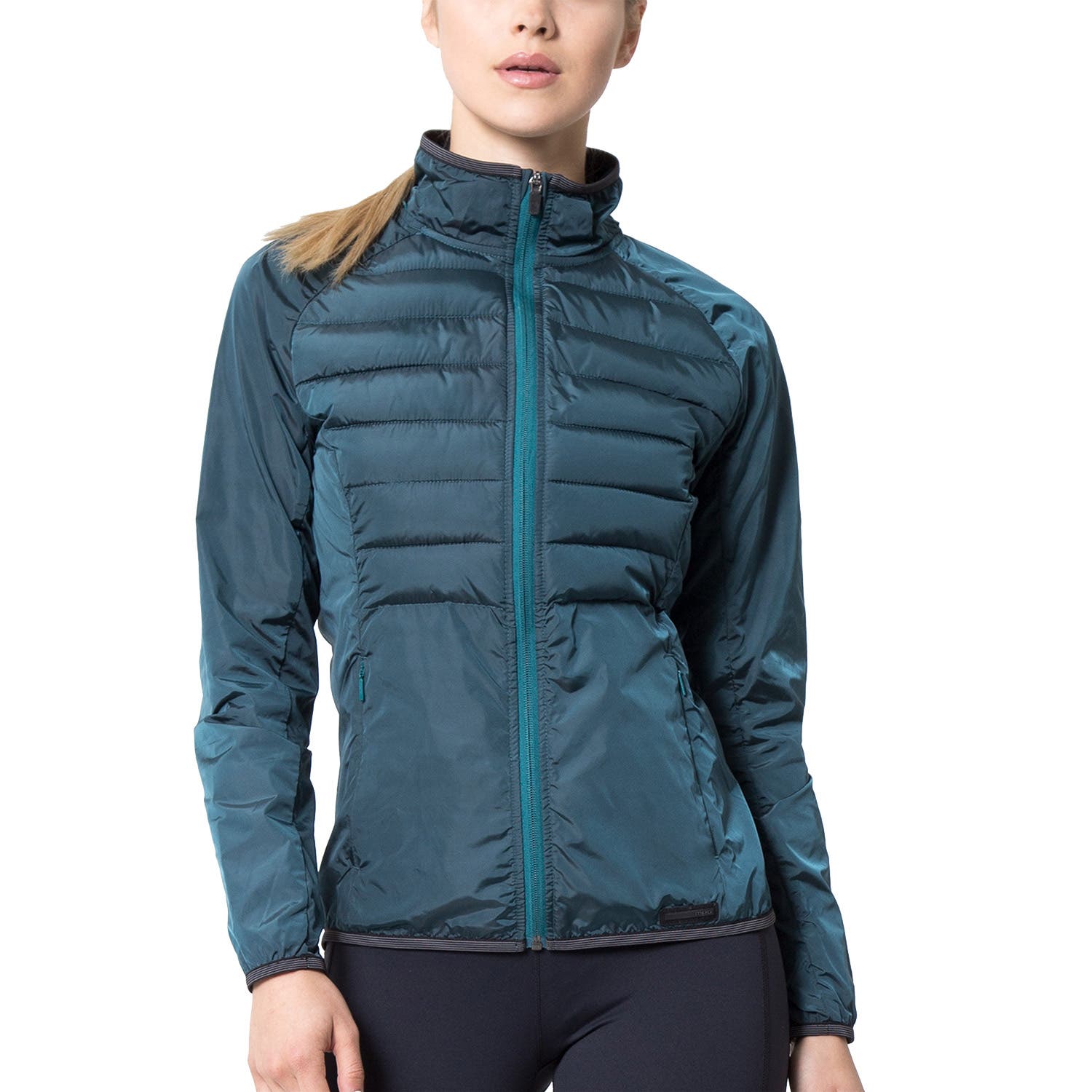 Woman wearing a jade green wind-resistant running jacket