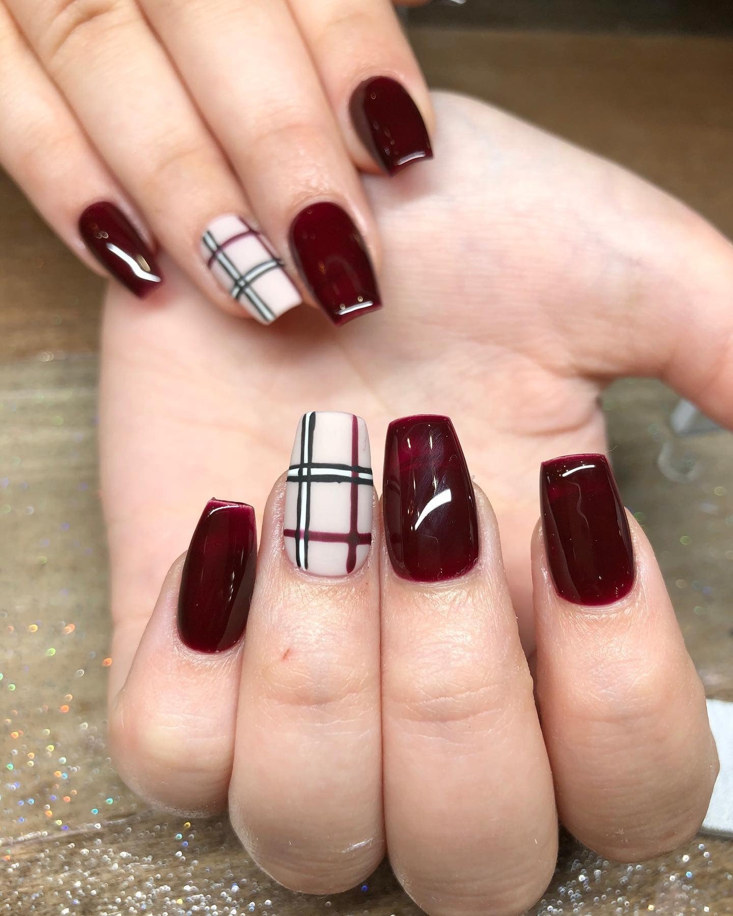 Burgundy nails with classic plaid nail art