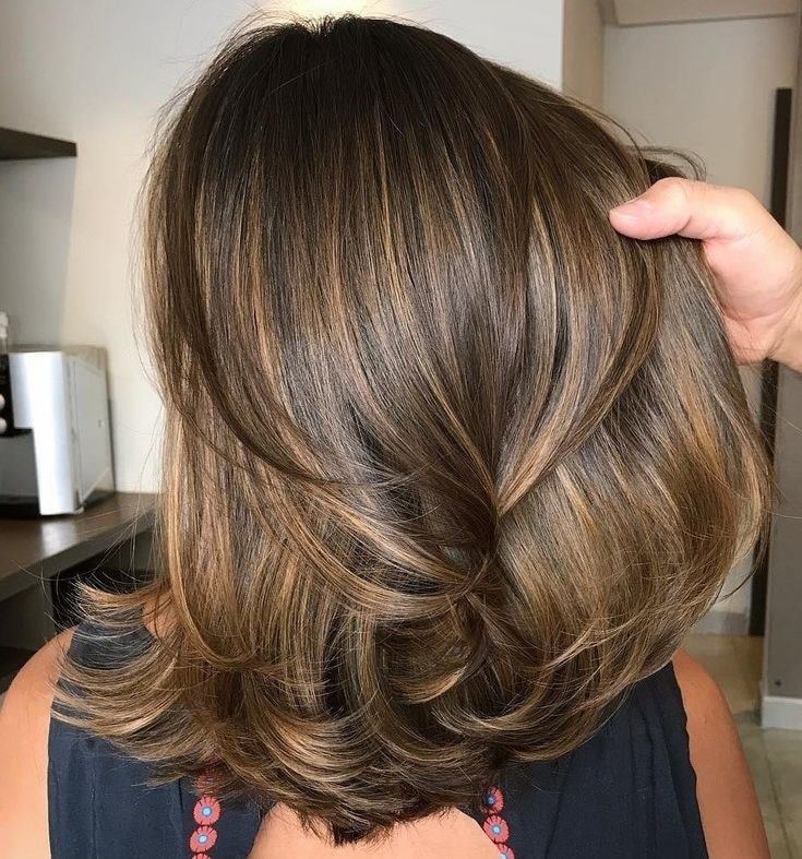 Layered brunette lob with dimensional balayage highlights