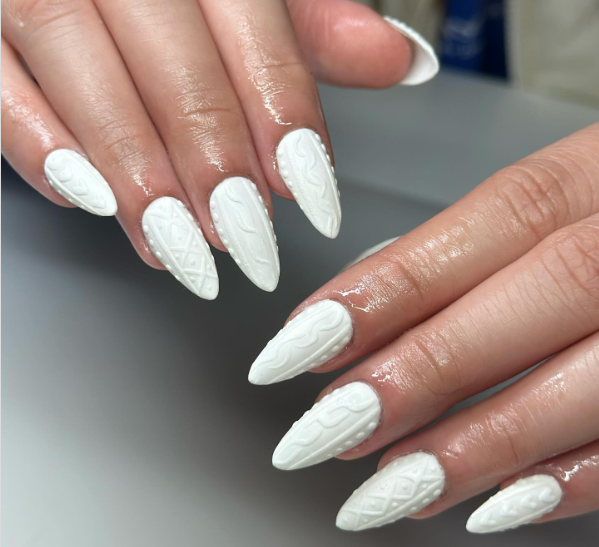 White cable-knit sweater nail art