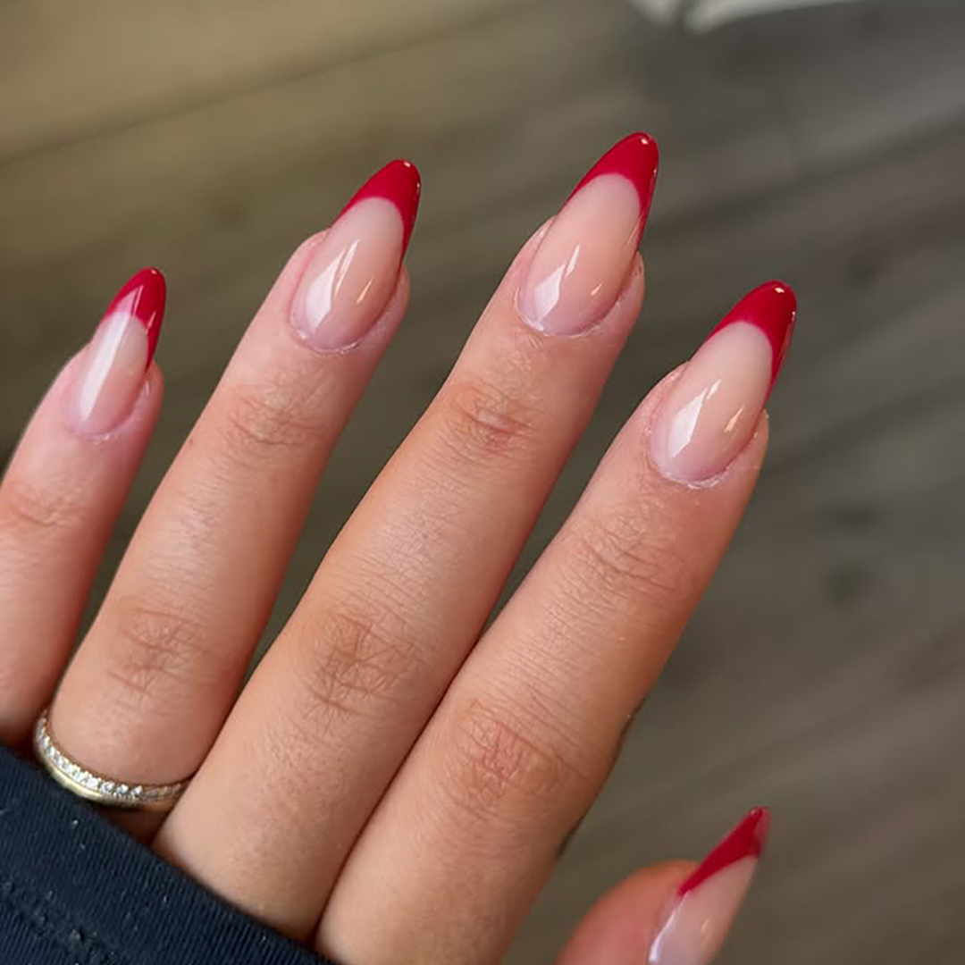 Long almond winter nails with red French tips