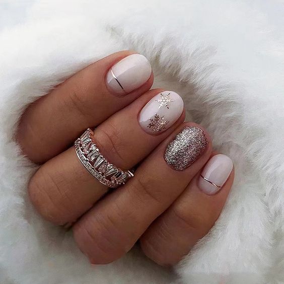 Short milky white Christmas nails with gold glitter and snowflake