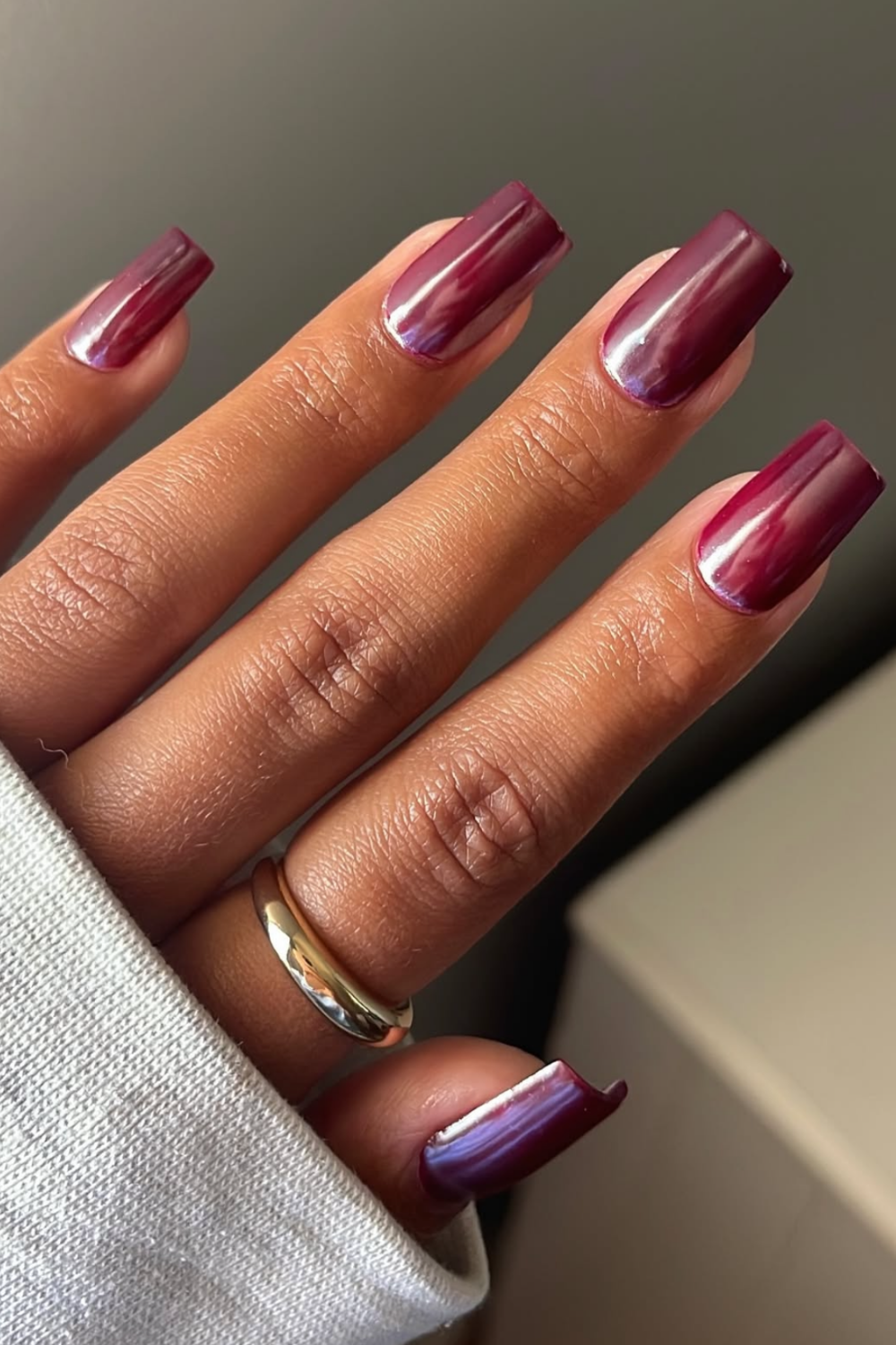 Berry chrome square nails on brown skin