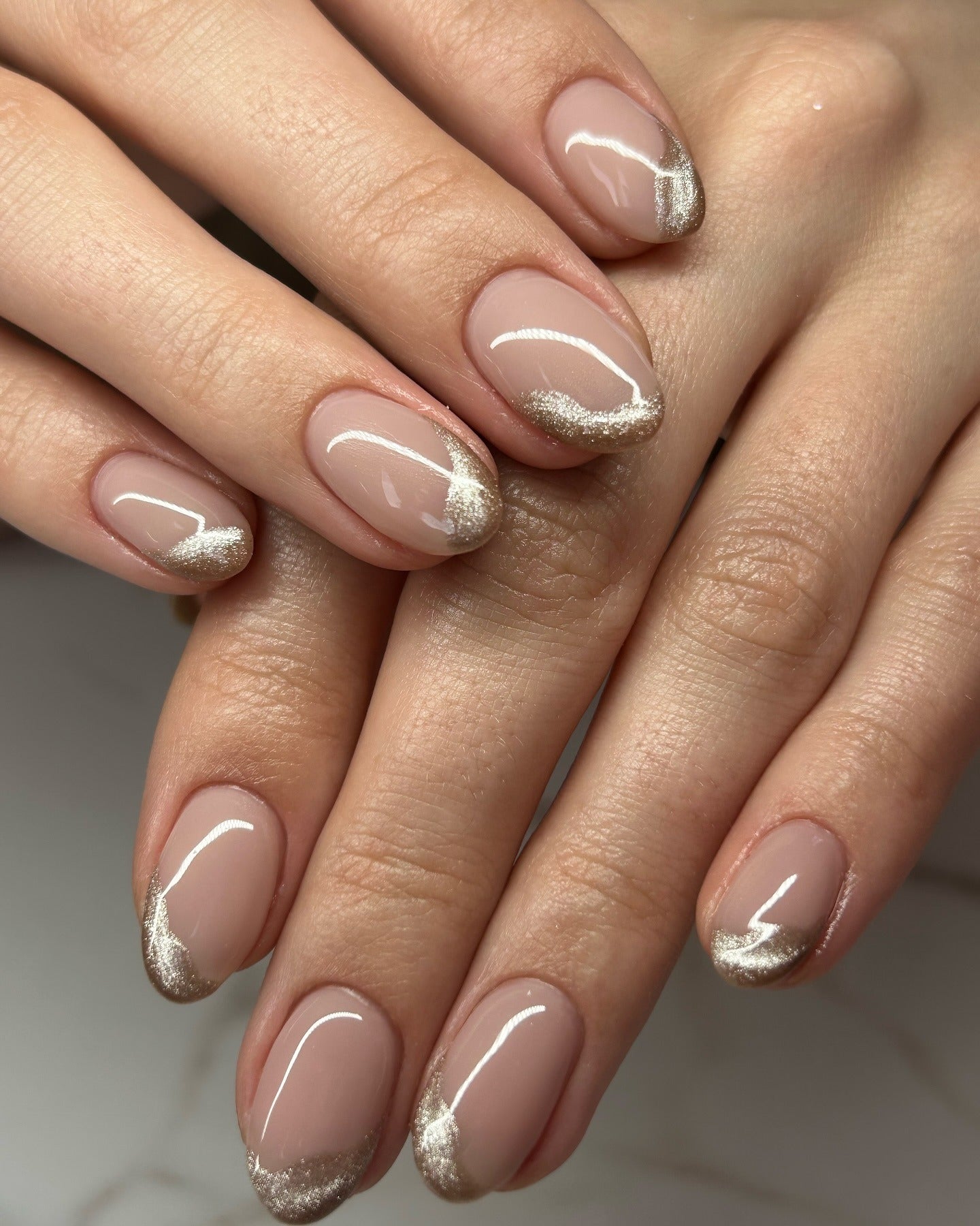 Ivory nails with a champagne glitter French fade