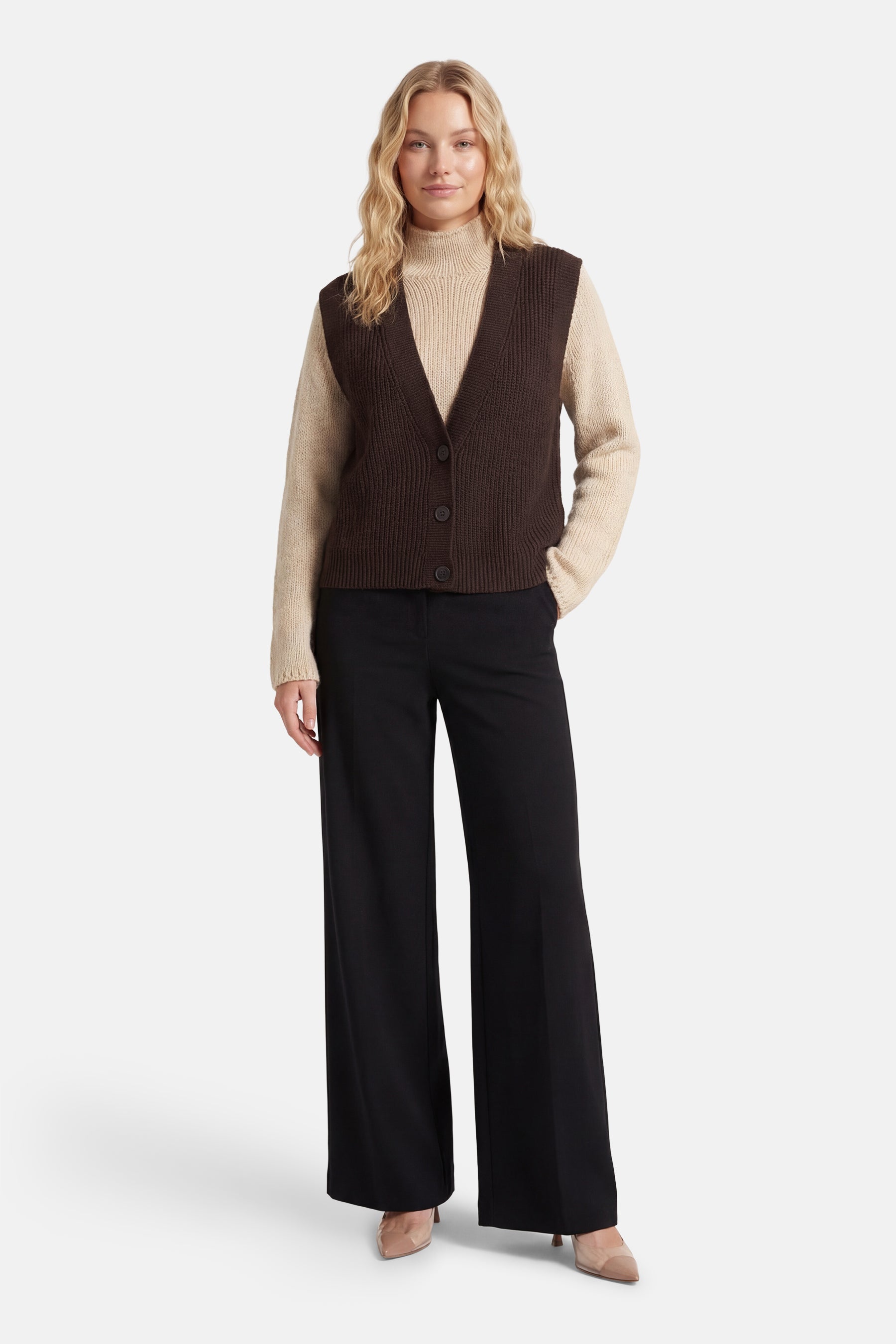 Chocolate brown argyle sweater vest layered over a collared shirt