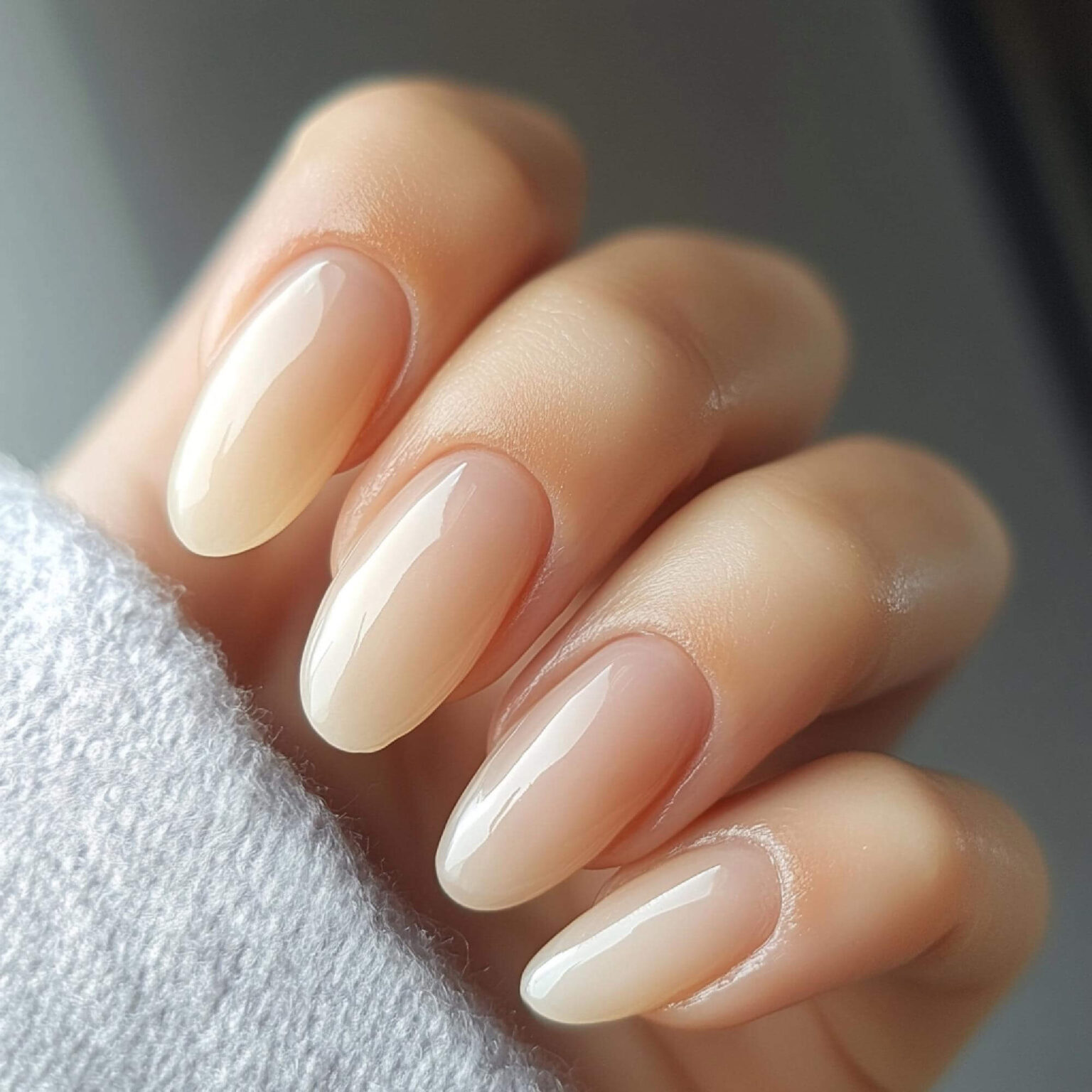 Nails with sheer latte ombre gradient from nude to caramel