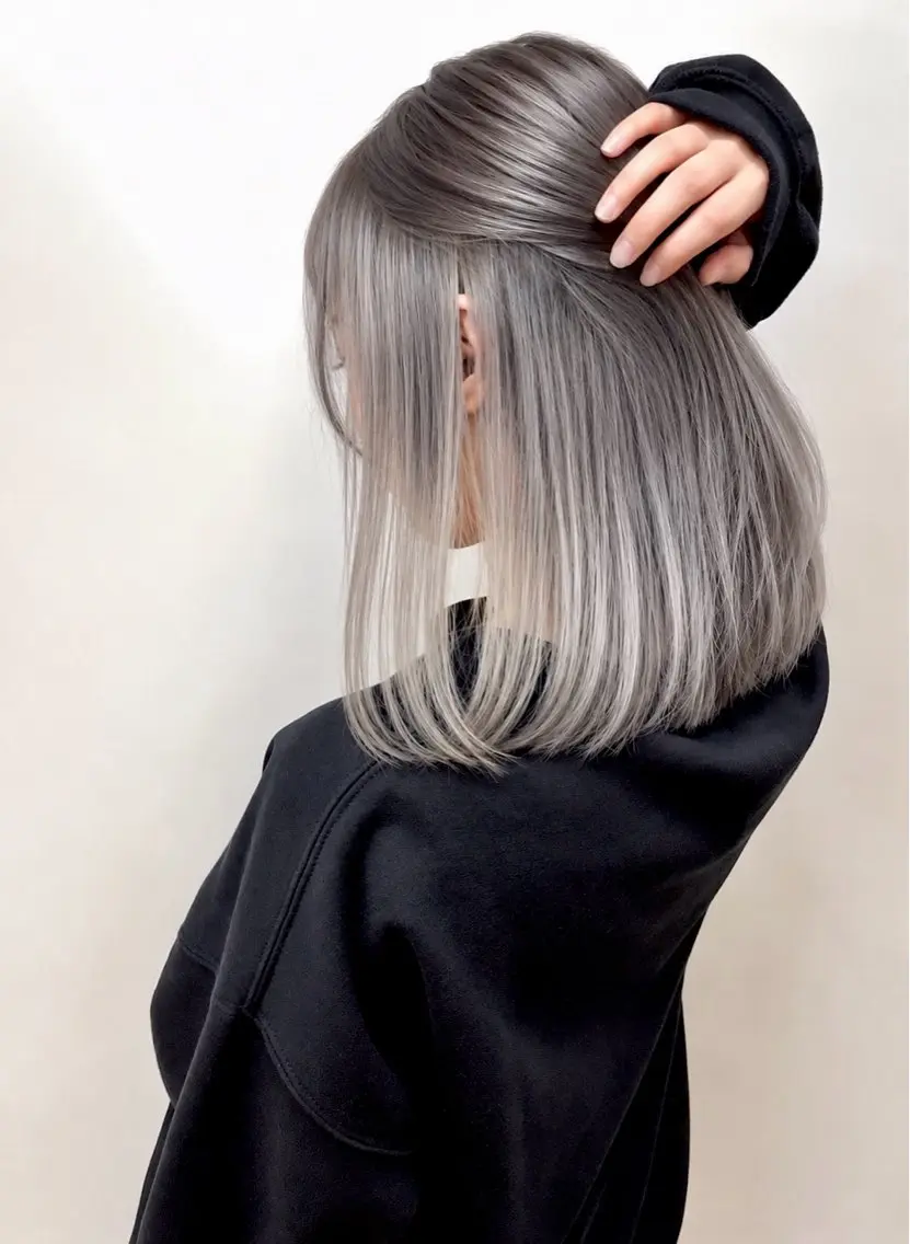 Ash gray lob with shadow root on gray hair