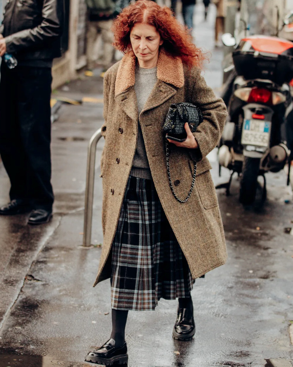 Woman in a tweed coat in a winter street-style look