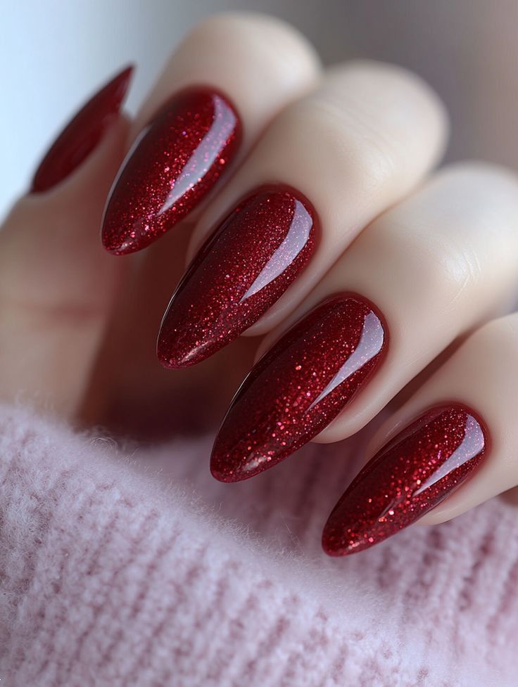 Burgundy wine-red fine glitter nails on almond nails