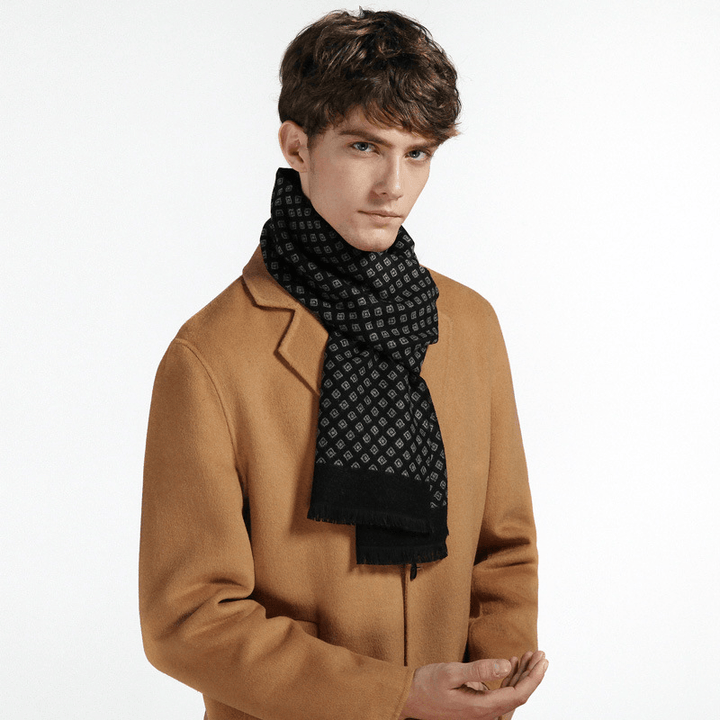 Man wearing a camel overcoat with a black patterned scarf