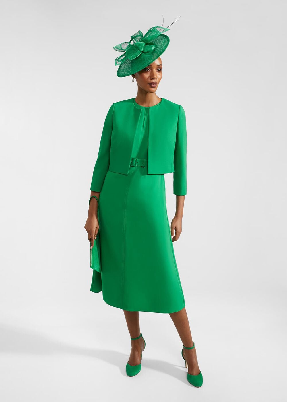 Emerald green Meera dress styled as a winter occasion outfit