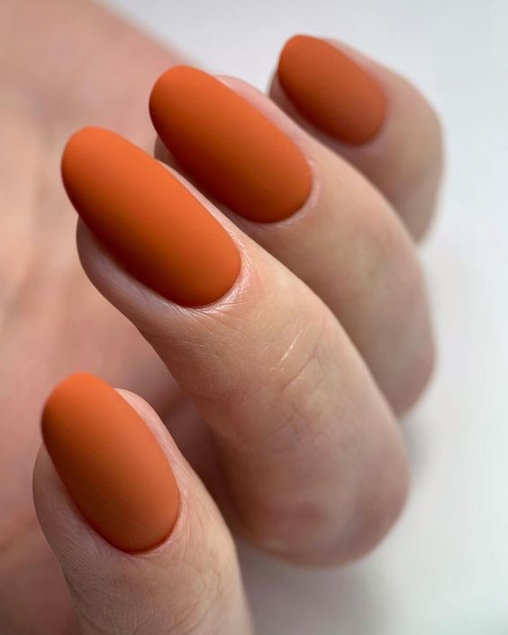 Short square nails in matte burnt orange