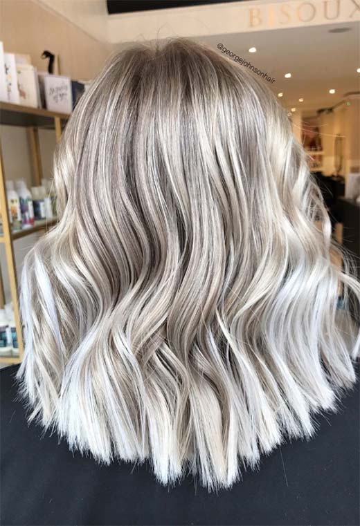Dark ash blonde hair with platinum balayage through the ends