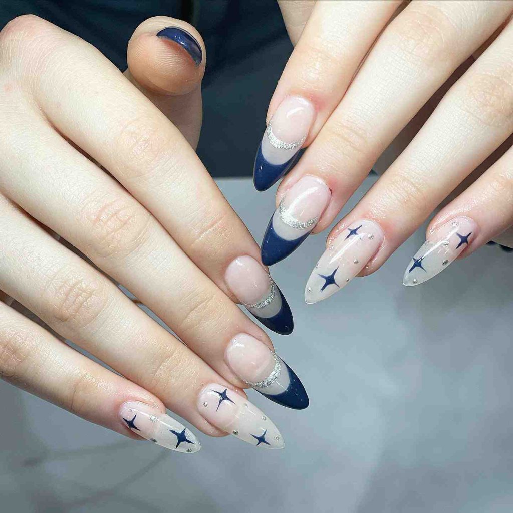 Midnight navy almond nails with silver star art