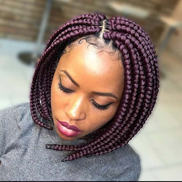 Burgundy bob box braids with a middle part