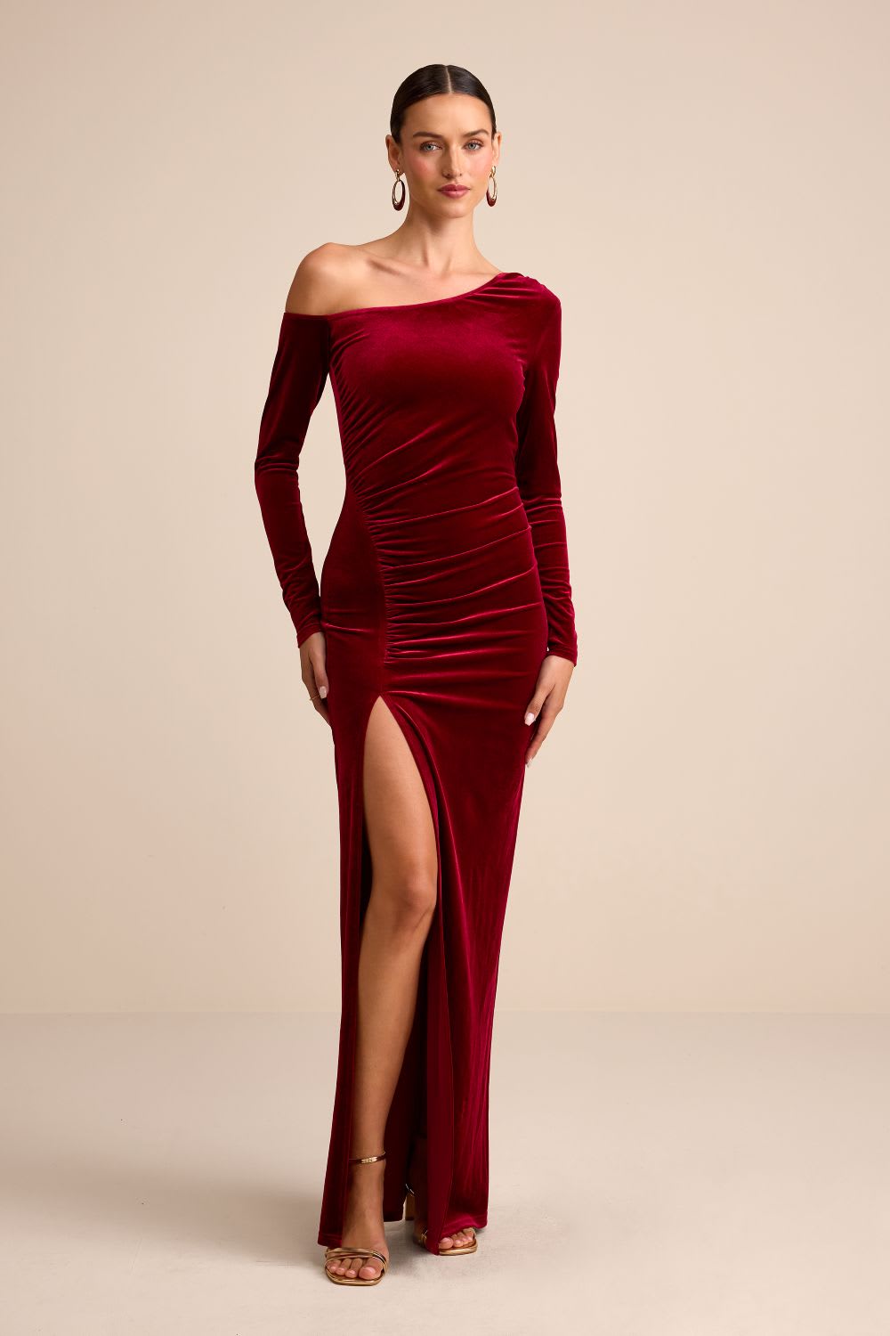Woman wearing a satin midi dress for a New Year's Eve celebration