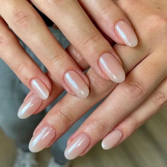 Almond nails with a milky pearl chrome glazed finish