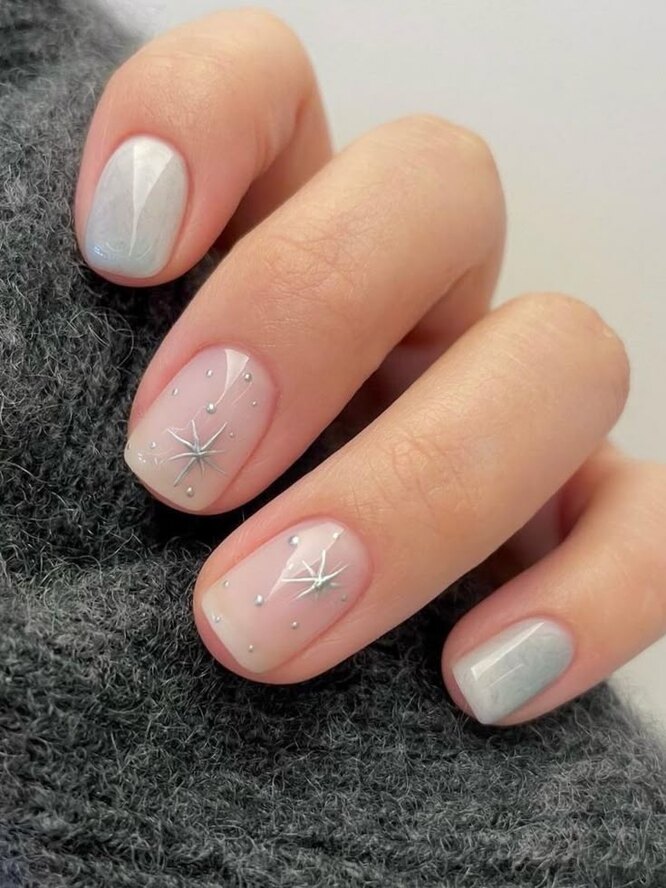 Short nails with icy pale blue gel polish