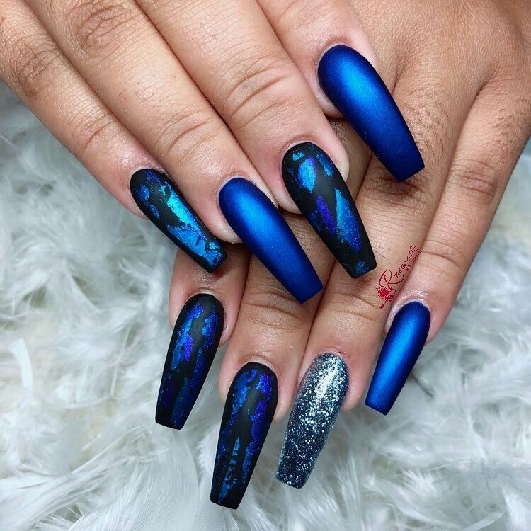Blue nails with iridescent shattered glass foil pieces