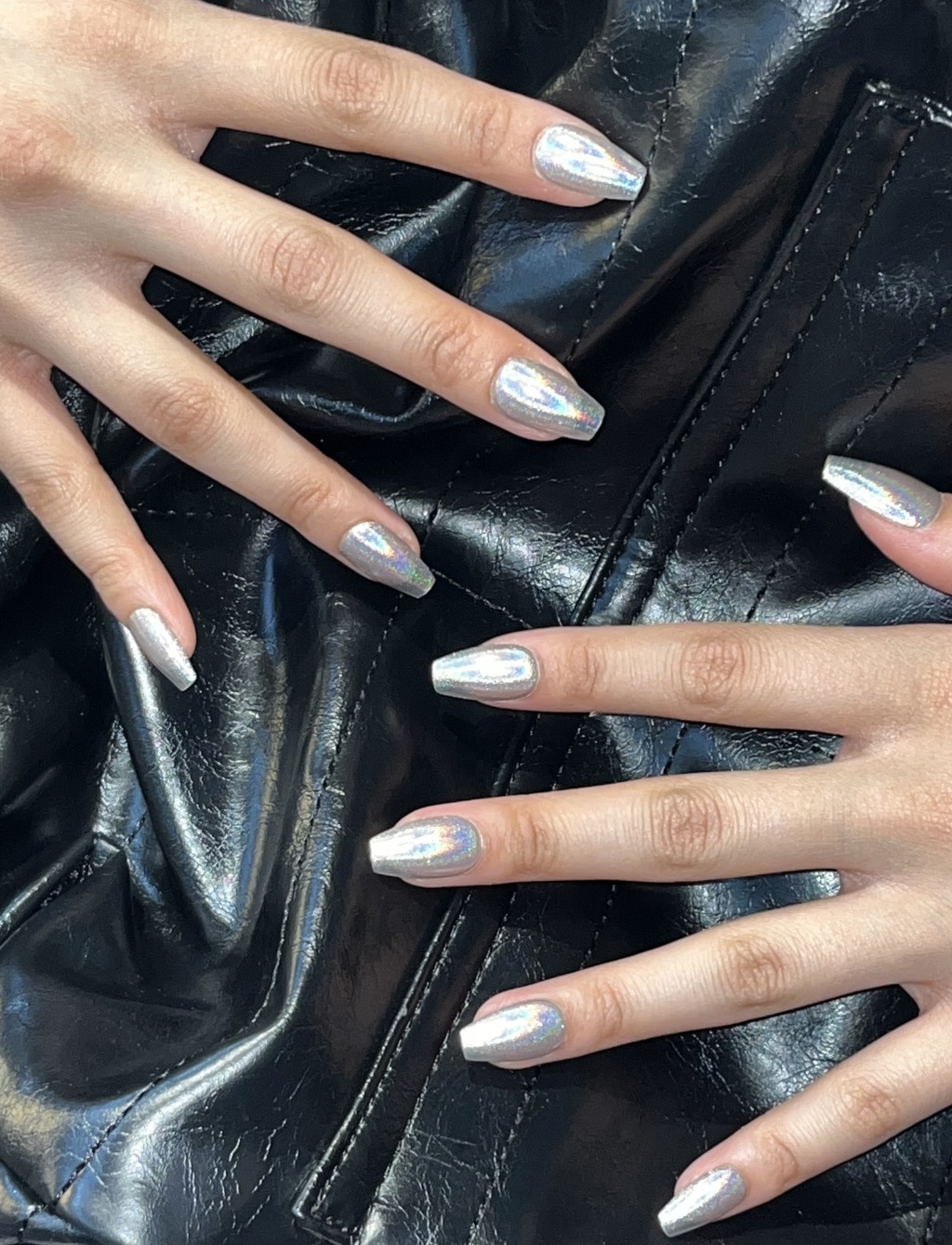 Holographic chrome nails with rainbow shimmer