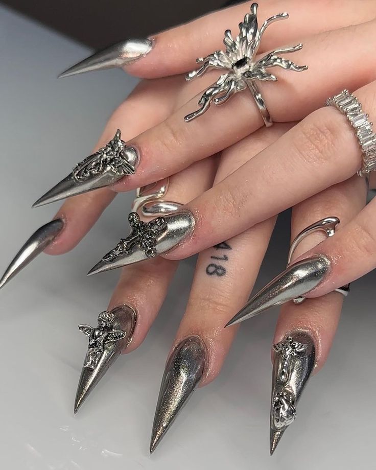 Long stiletto nails with mirror silver chrome finish
