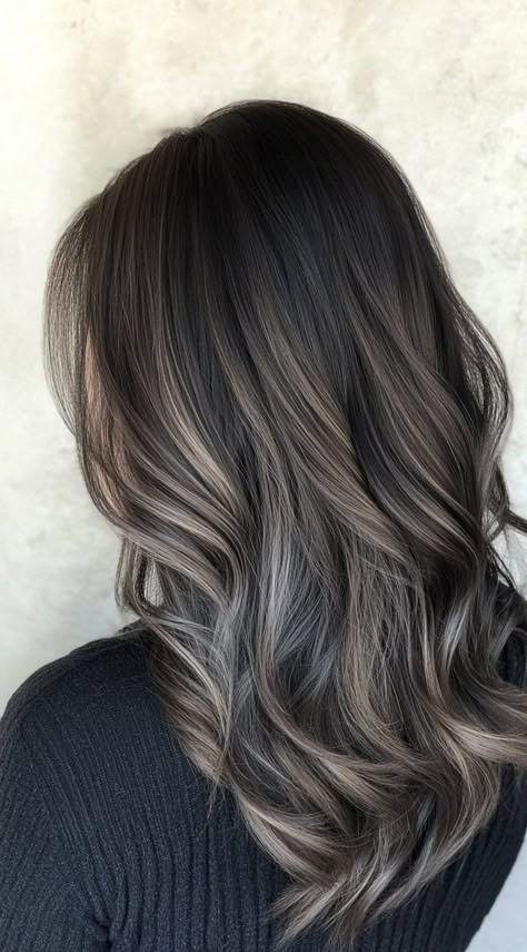 Dark ash brown wavy hair with smoky dimension