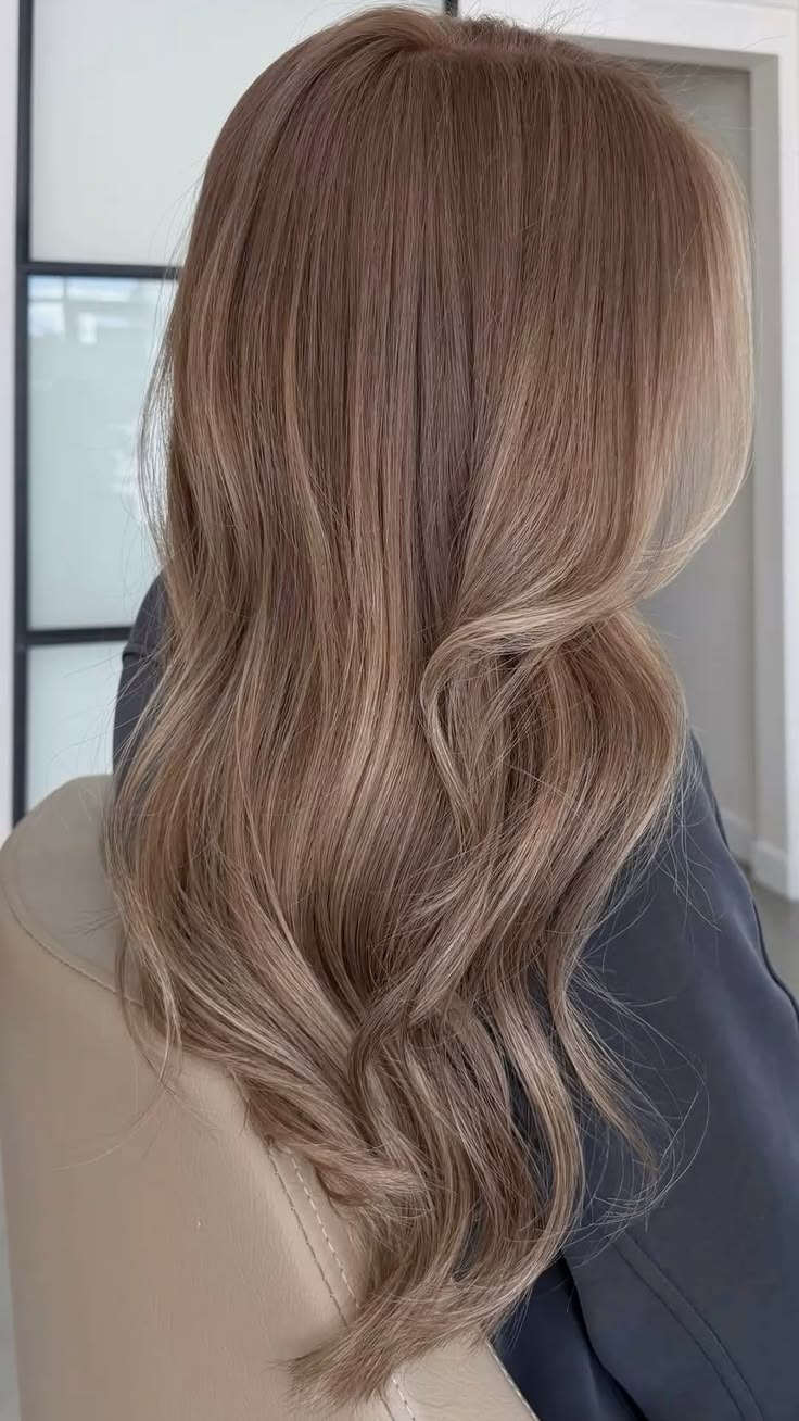 Medium brown hair with auburn balayage