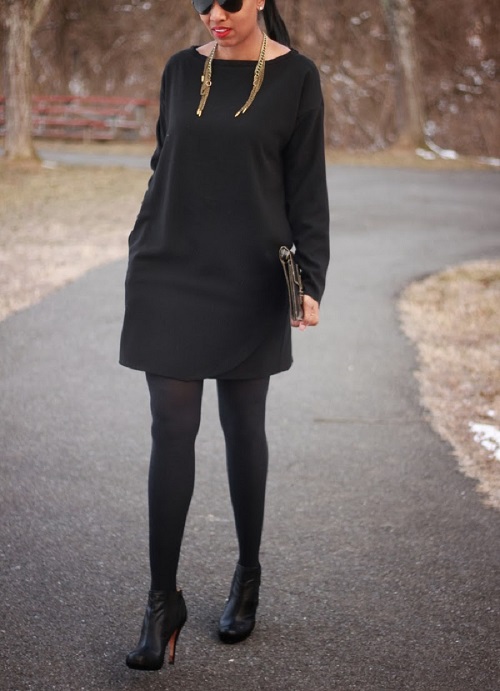 Woman wearing a little black fit and flare dress