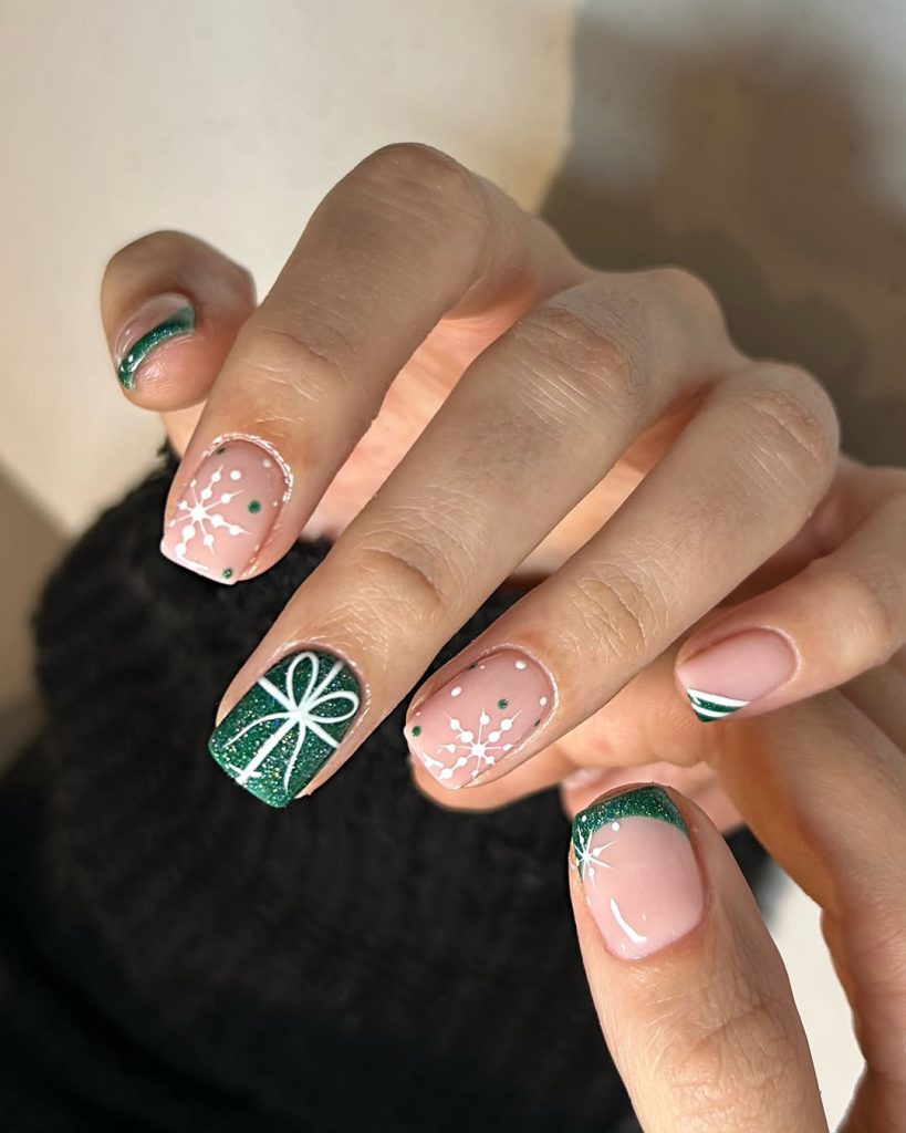 Short green glitter Christmas nails with snowflake and green French tips