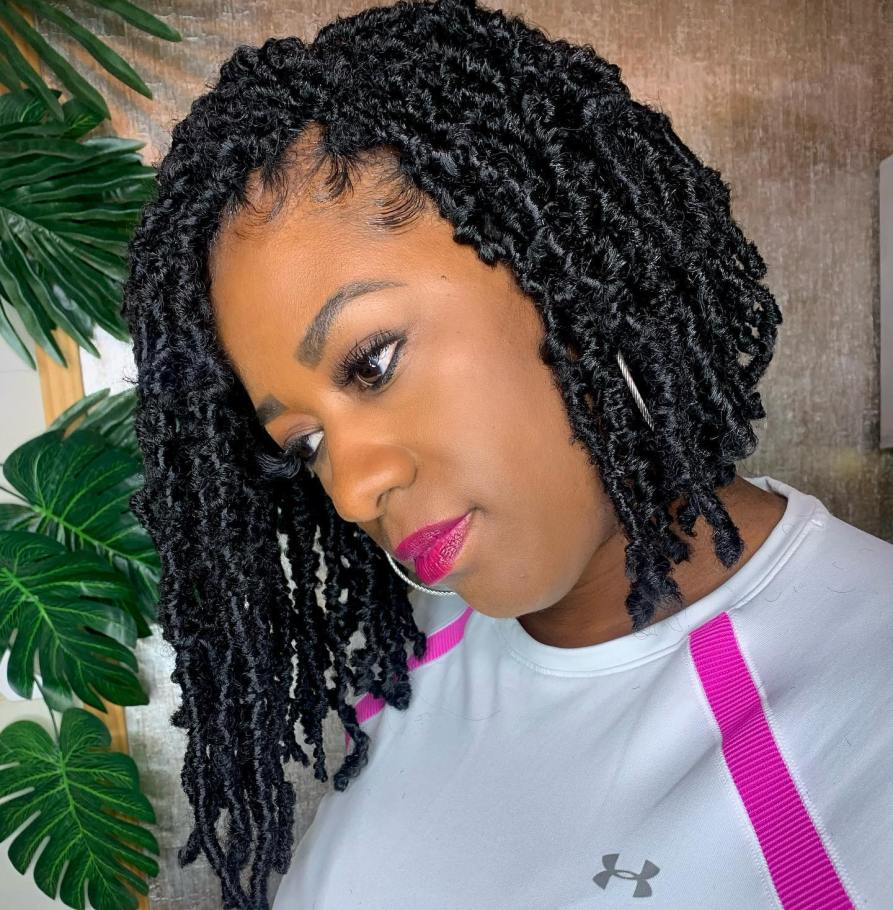 Chin-length bob of curly distressed locs