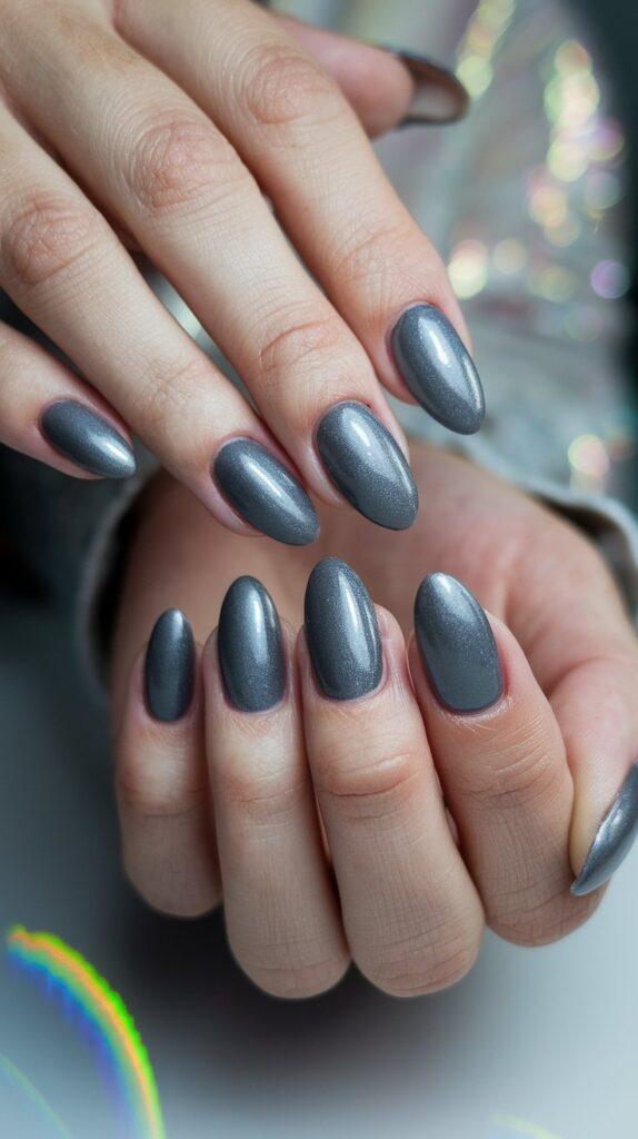 Almond nails in metallic gunmetal gray shimmer with a cat-eye sheen