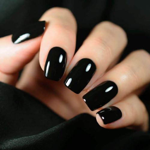 Short nails in solid glossy black polish
