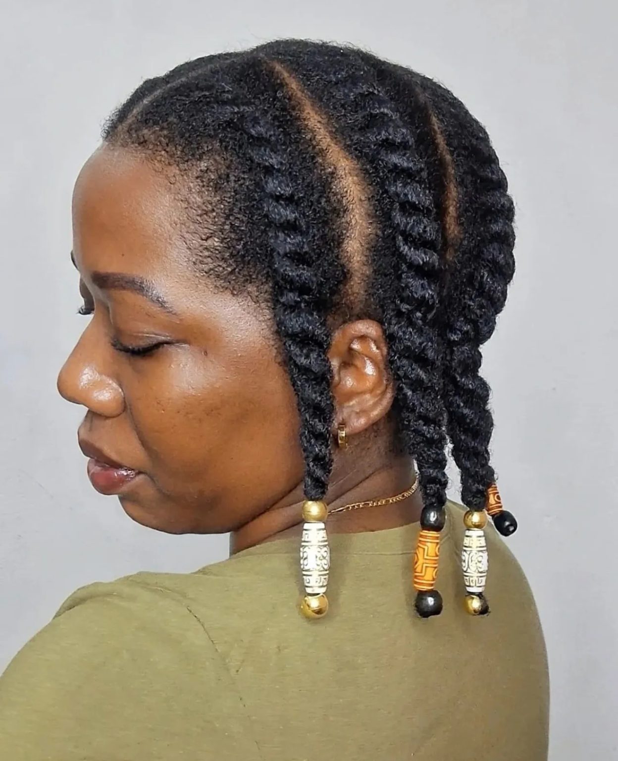Chunky flat twists finished with carved wooden beads