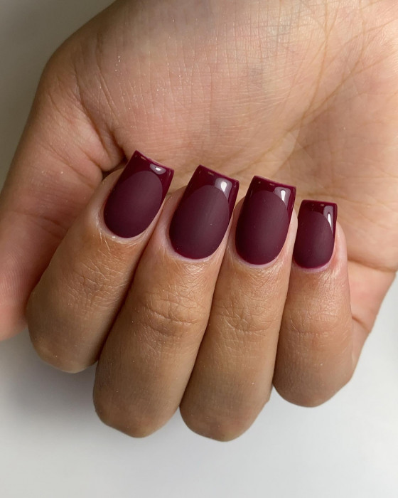 Matte burgundy nails with glossy burgundy French tips