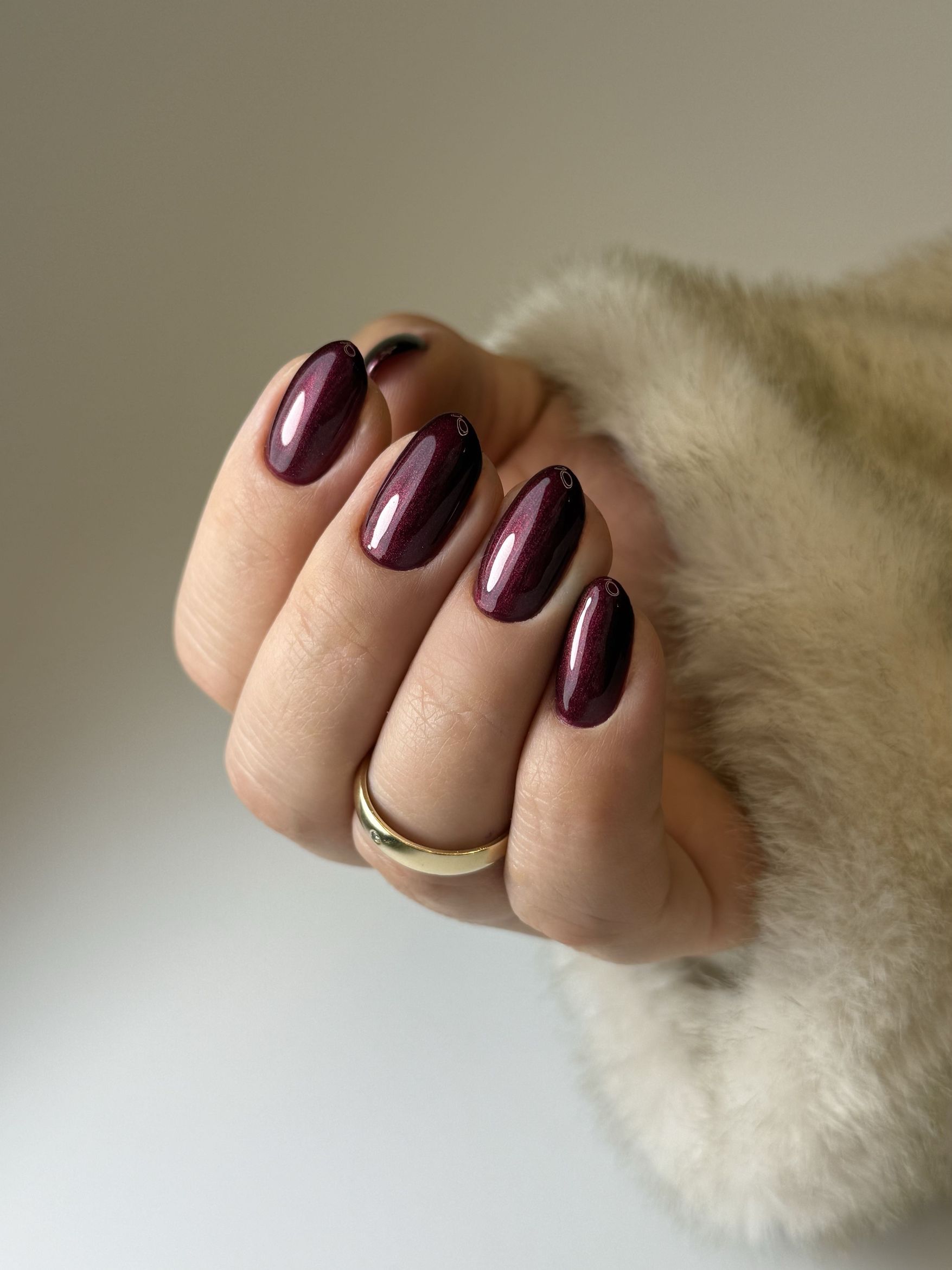 Deep burgundy wine nails with a subtle shimmer