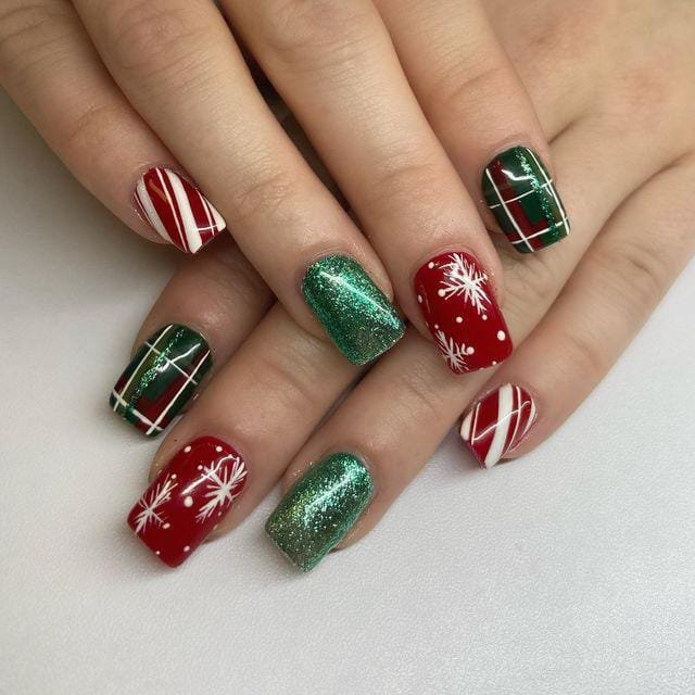 Short Christmas nails with plaid, candy stripes, snowflakes and green glitter