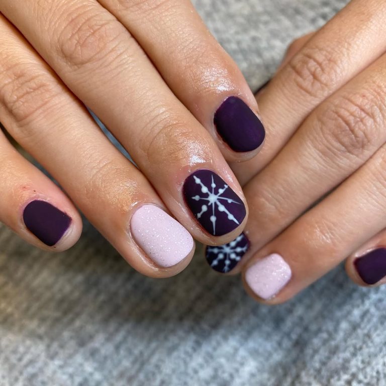 Plum purple matte nails with snowflake nail art