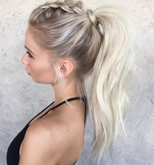Tousled ponytail paired with a French braid across the crown