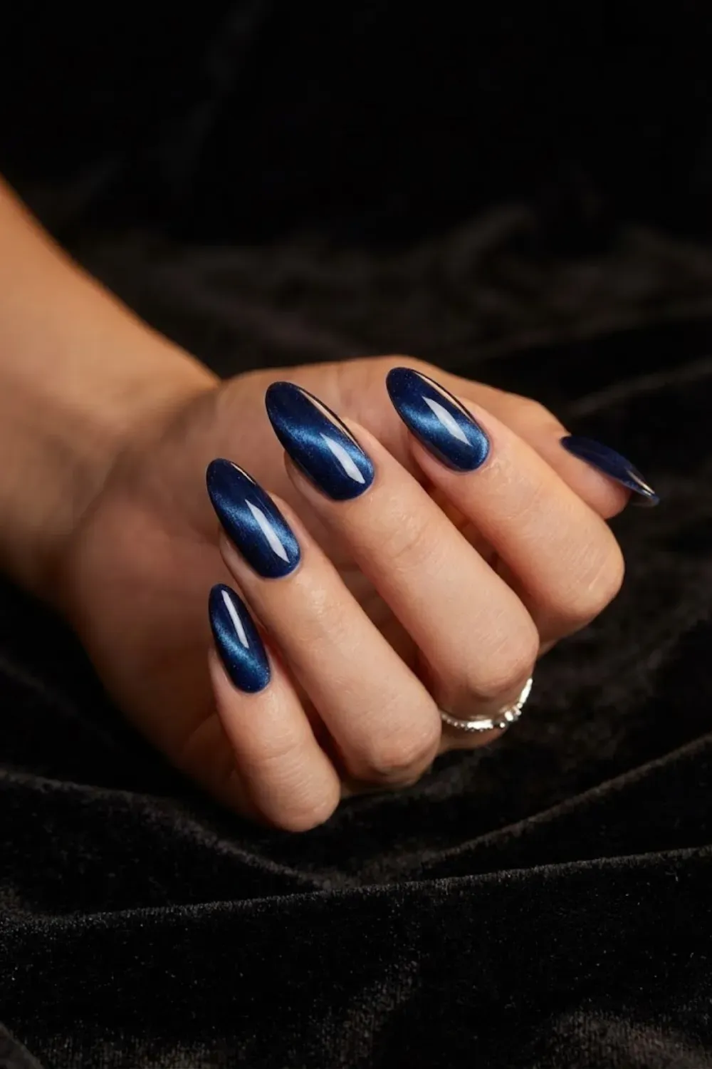 Midnight Velvet: an inky blue velvet on oval nails