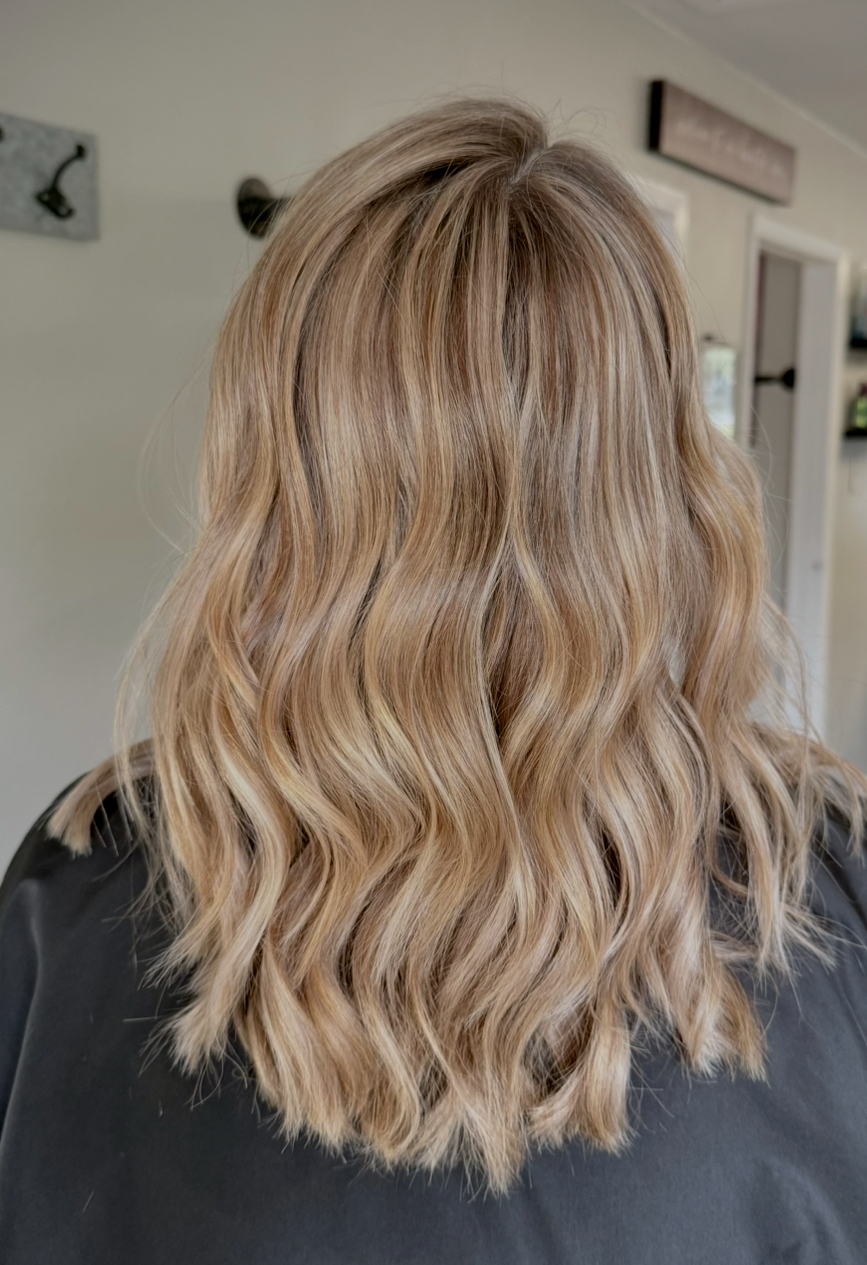 Textured midi cut in light blonde with peanut-butter lowlights, back view