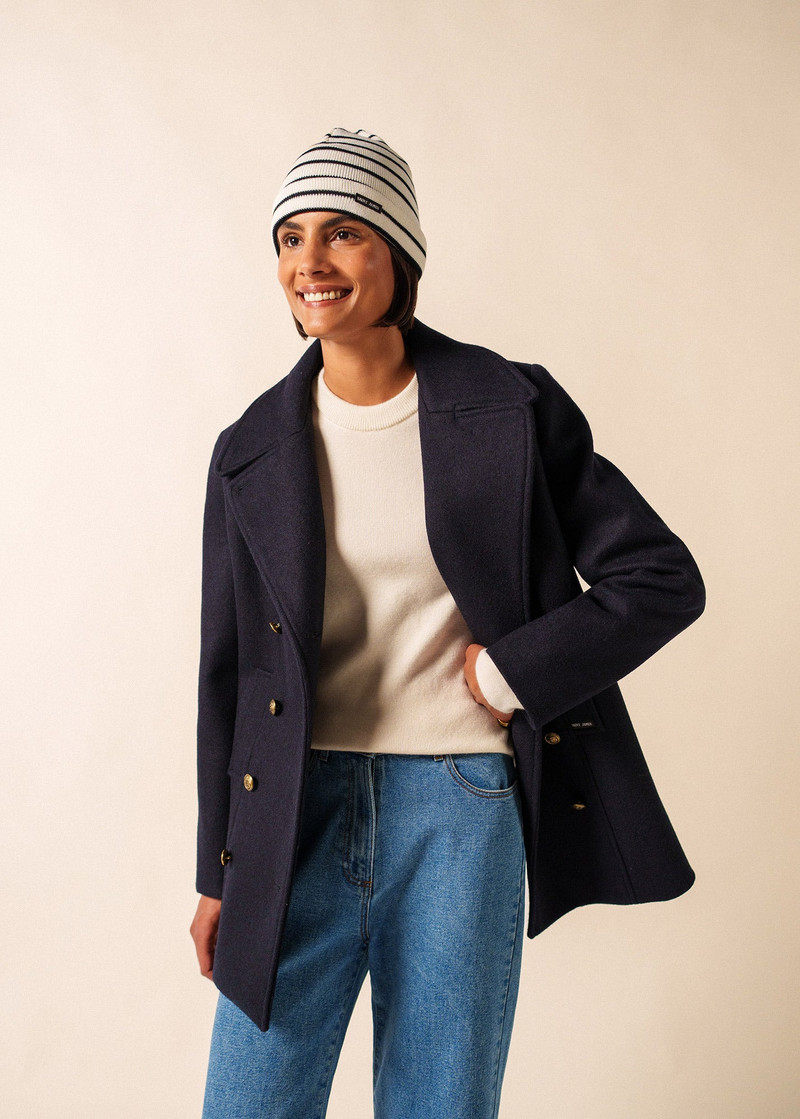 Navy peacoat styled for a winter outfit