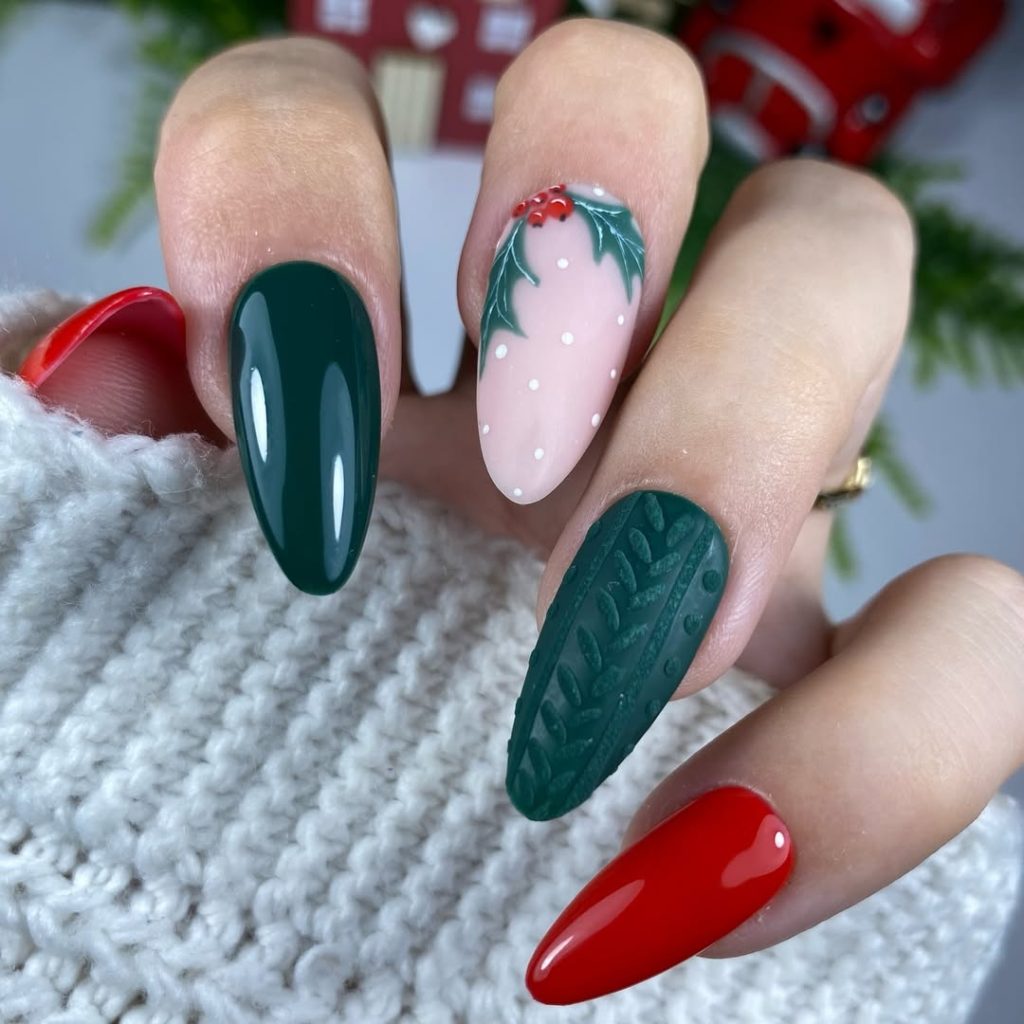 Almond nails in shimmery green with Grinch-inspired Christmas art