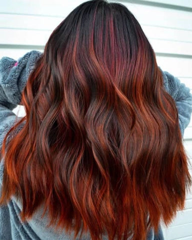 Copper hair with dark shadow root, medium length